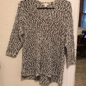 Black and white crochet sweater.